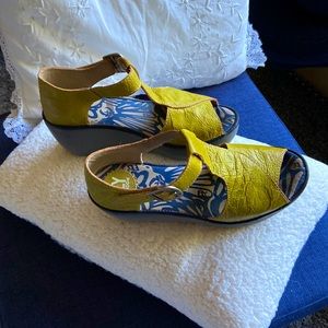 Chartreuse green Fly London sandals, size 6.5 mediums.